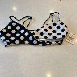 Volcom swim suit top new with tags size large. Super cute it’s a dot crop style.